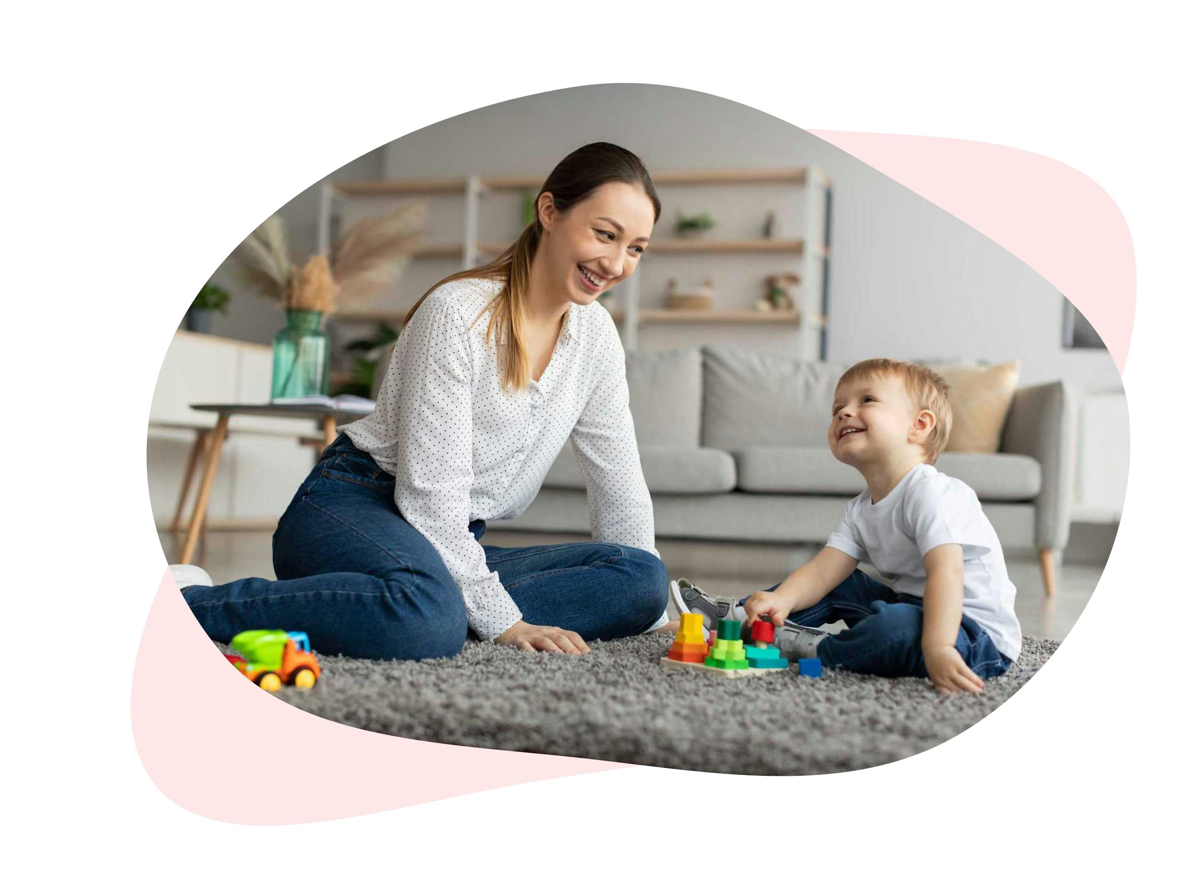 Chůva si hraje s dítětem